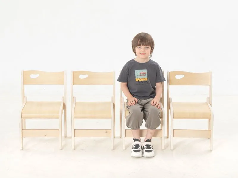Set of 4 Ole children's chairs with a seated child Set of 4 Ole children's chairs with a seated child